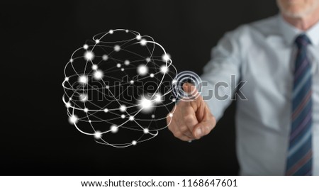 Man touching a global connection concept on a touch screen with his finger