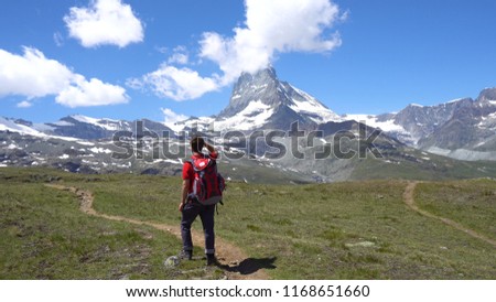 Young Hiker in Alpine Mountains