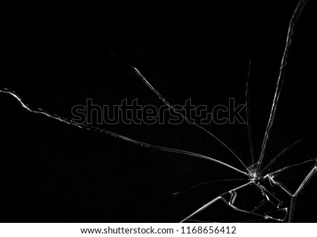 Shards of a broken glass on a black background, shattered pieces. Useful texture in overlay mode. Horizontal shot.
 Royalty-Free Stock Photo #1168656412