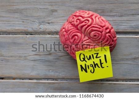 Quiz night label stuck on a brain