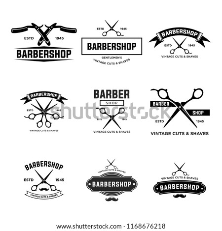 Set of vintage barber shop badges and emblems . EPS 10
