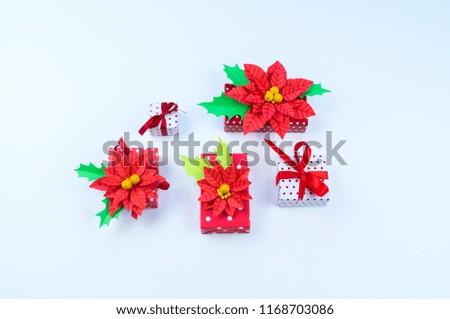 Christmas gift boxes and decorations. Flat lay template. The time of the Christmas miracle. Red decorative ornament on a white background.