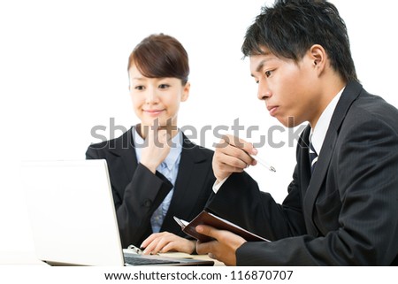 Young asian smiling business woman and businessman