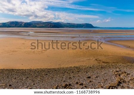 A view across the Conwy estuary, Wales towards the foothills of Snowdonia in summertime