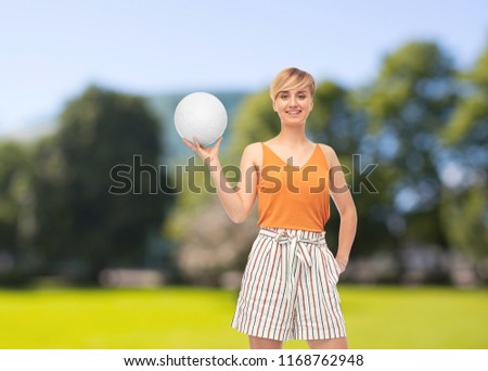 sport, leisure and people concept - smiling teenage girl with volleyball over summer park background