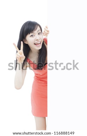 beautiful young woman holding blank billboard, isolated on white background