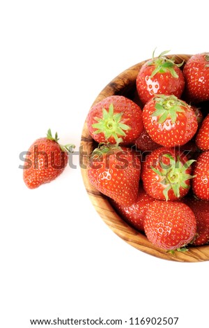 Fresh strawberries in bowl isolated on white background