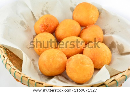 Thai Fried Sweet Potato Balls / general desserts for Snack in basket on white background 