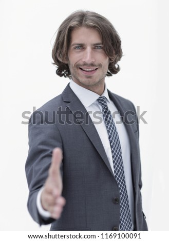 Businessman offering handshake to you on white background