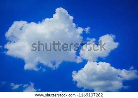 Beautiful white clouds on the blue sky bankground.