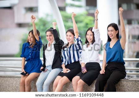 Group of Multiethnic Cheerful Female at City stree