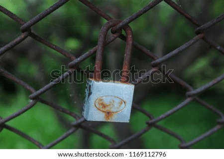 Key lock on the fence.