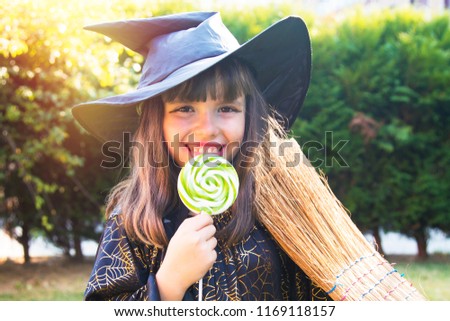 portrait of witch with lollipop, halloween party