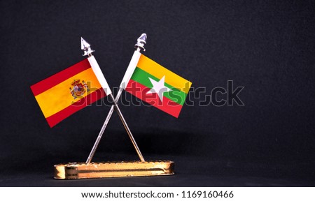 Spain and Myanmar table flag with black Background