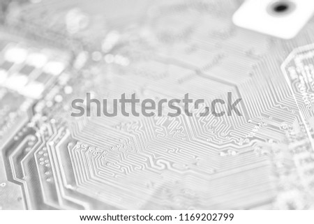 blurred circuit board in the light like concept of technology and future micro technology and computer
 Royalty-Free Stock Photo #1169202799