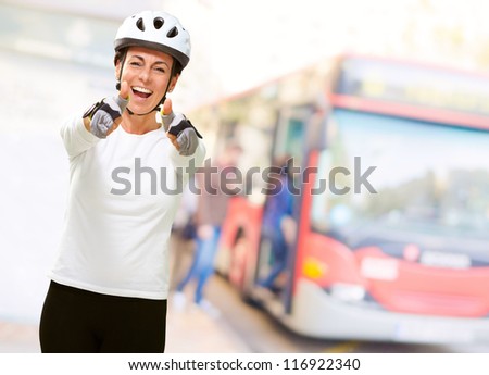 Woman Wearing Helmet Showing Both Thumbs Up, Outdoor