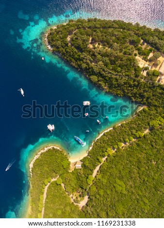 On top of Skorpios coastline. The famous Skorpios island near Lefkada island on Ionian sea in Greece. Drone photography.