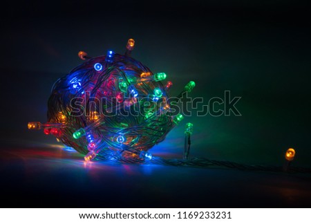 Multicolored garland on a dark background