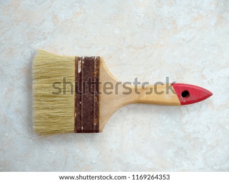 Paint Brushes For Walls that are old, dirty and rusty