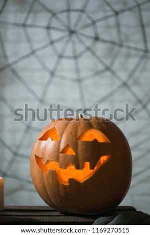 Background of the Pumpkin Spiders candles and other attributes of the autumn holiday Happy Halloween