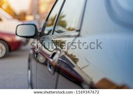 the left side of the car side view mirror