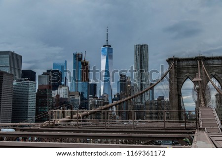 View to Manhattan skyline over Brooklyn Bridge