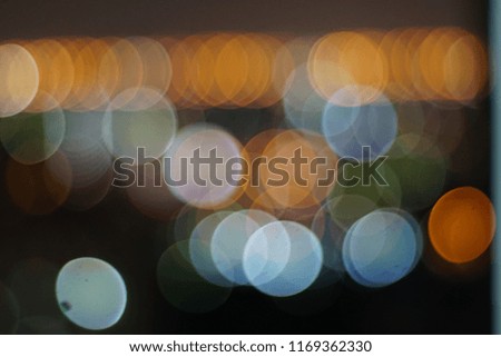 Bokeh abstract texture. Colorful. Defocused background. Blurred bright light. Circular points.Festive Unfocused Backdrop.