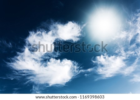 Deep blue sky as  background and clouds