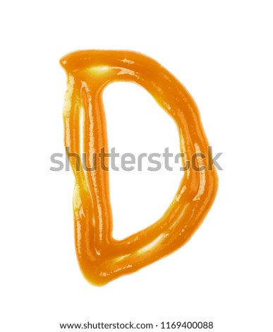 Single latin letter D made of smeared food sauce isolated over the white background