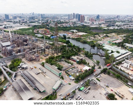 Aerial view oil refinery industry at industrial estate Thailand. Crude Oil Production / Countries of the World - Metal Oil Storage Tanks