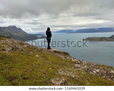 Girl sitting on the rock