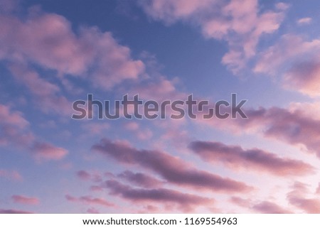 Blue sky with clouds before sunset, background