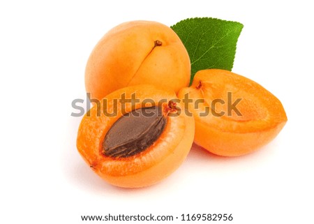 Apricot fruits with leaves isolated on white background macro