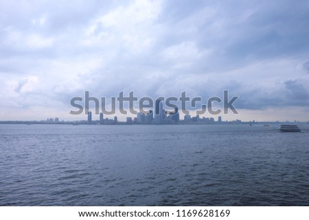 Blur picture view of Manhattan, New York City while raining. View from Staten Island Ferry.