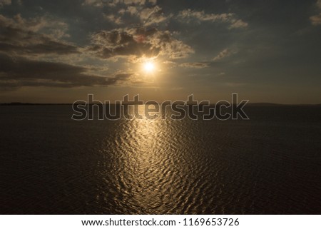 Beautiful sunset above the sea on a warm evening