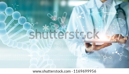 Medicine doctor touching electronic medical record on tablet. DNA. Digital healthcare and network connection on hologram modern virtual screen interface, medical technology and network concept. Royalty-Free Stock Photo #1169699956