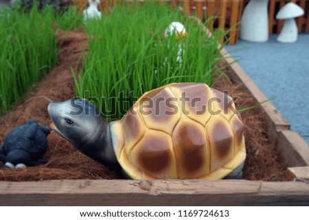 Turtle statue in the field                               