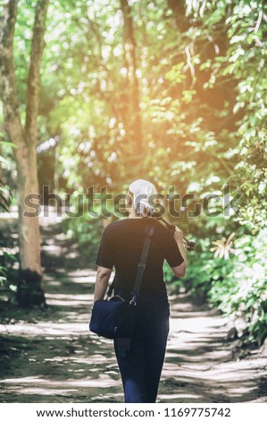 photographer traveling into the forest for beautiful forest pictures