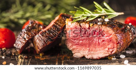 Fresh fillet steak  Royalty-Free Stock Photo #1169897035
