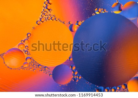 Abstract background with colorful gradient colors. Oil drops in water abstract psychedelic pattern image.
