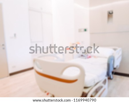 Blurred photo of Empty Bed On Hospital Ward.