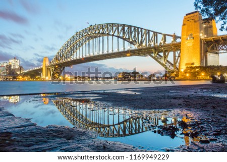 Reflection of sydeny harbor bridge