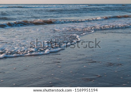 Small waves washing ashore