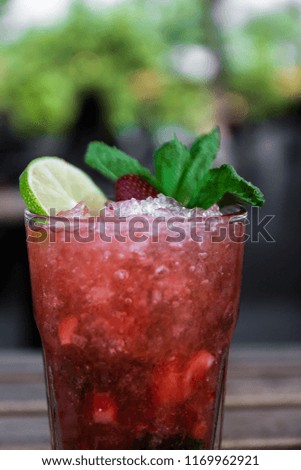 Mojito with strawberry. Food photo. In the Restaurant
