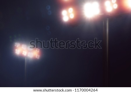 stadium lights in sport game in dark night sky background