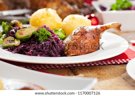 Christmas roast duck served on a festive table