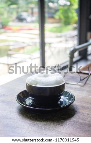 Soft focus on capuccino coffee cup, coffee for background - vintage effect process picture