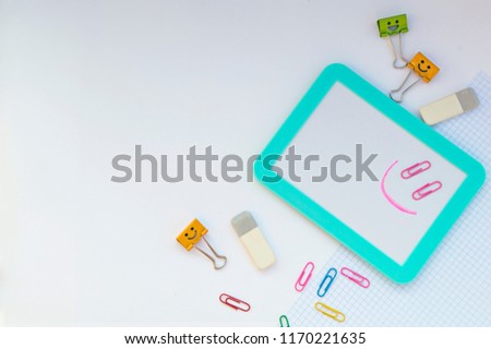 Stationery on a light background top view. School background. Day of knowledge. September 1.