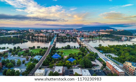 Drone Aerial of Downtown Chattanooga TN Skyline, Coolidge Park and Market Street Bridge. Royalty-Free Stock Photo #1170230983