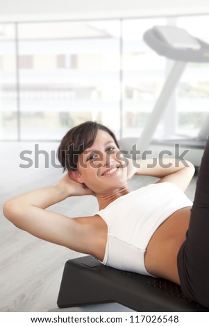 beauty girl make abs exercise on step
